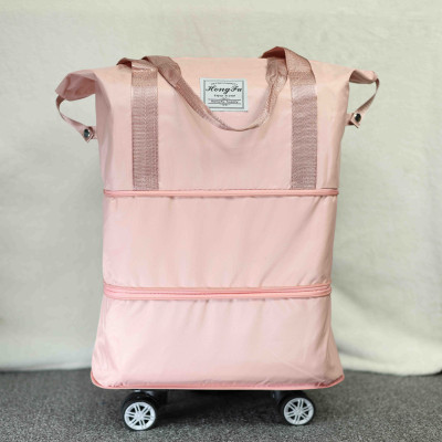 বেবি পিংক কালার ট্রলি ব্যাগ